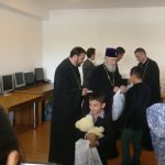 22 de copii au primit daruri din partea Arhiepiscopiei Târgoviște