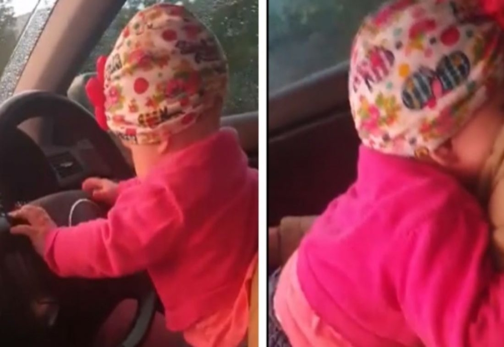 INCONŞTIENŢĂ: Un clujean și-a pus fetița de numai câteva luni la volan, în timp ce conducea pe stradă