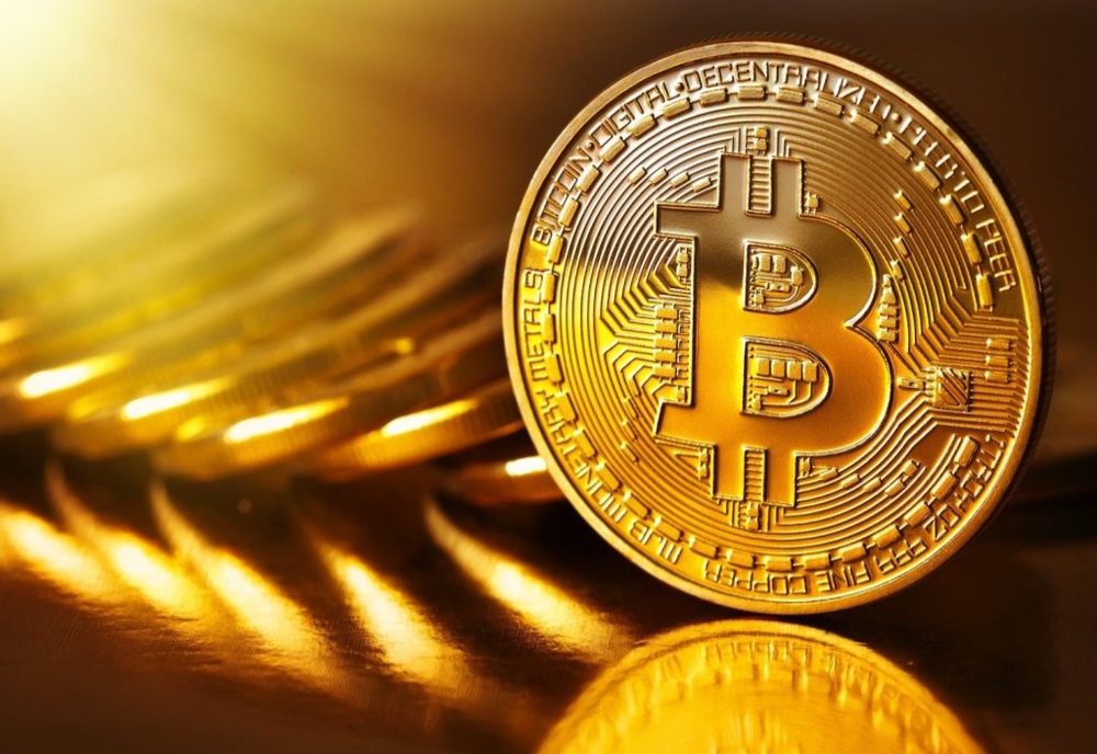 Bitcoin a depășit pragul de 10.000 de dolari pe unitate pentru prima oară de la începutul lunii iunie