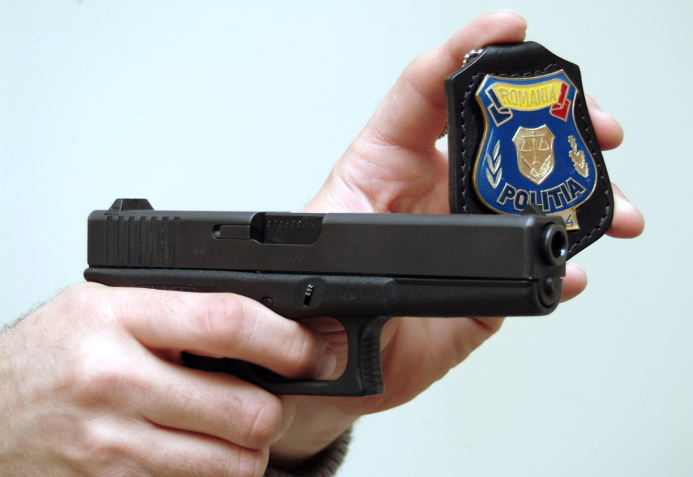 Un polițist din județul Giurgiu a fost găsit împușcat în cap
