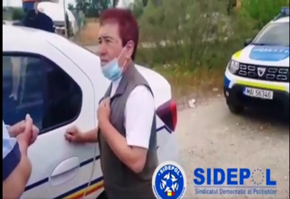 VIDEO. Împiedicată de poliţişti să se sinucidă în apele râului Olt