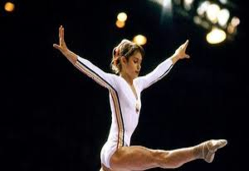 Nadia Comăneci, prima gimnastă care a primit 10 la un concurs internațional, împlinește 60 de ani